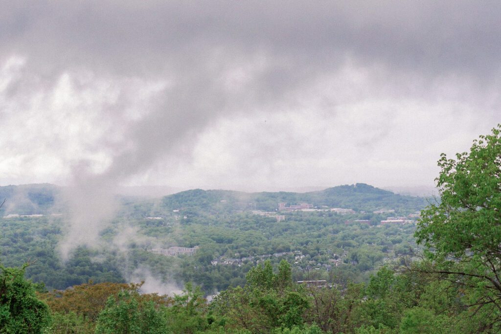 Cloudy mountain view of spring Montalto wedding rainy day event.