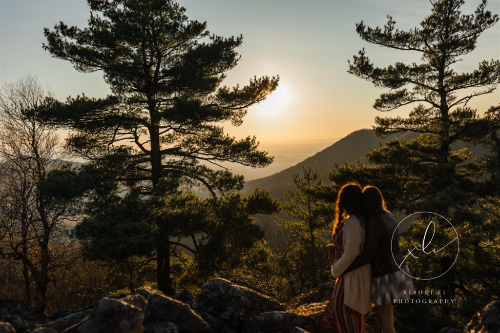 Engaged couple on outdoor hike during Charlottesville pictures