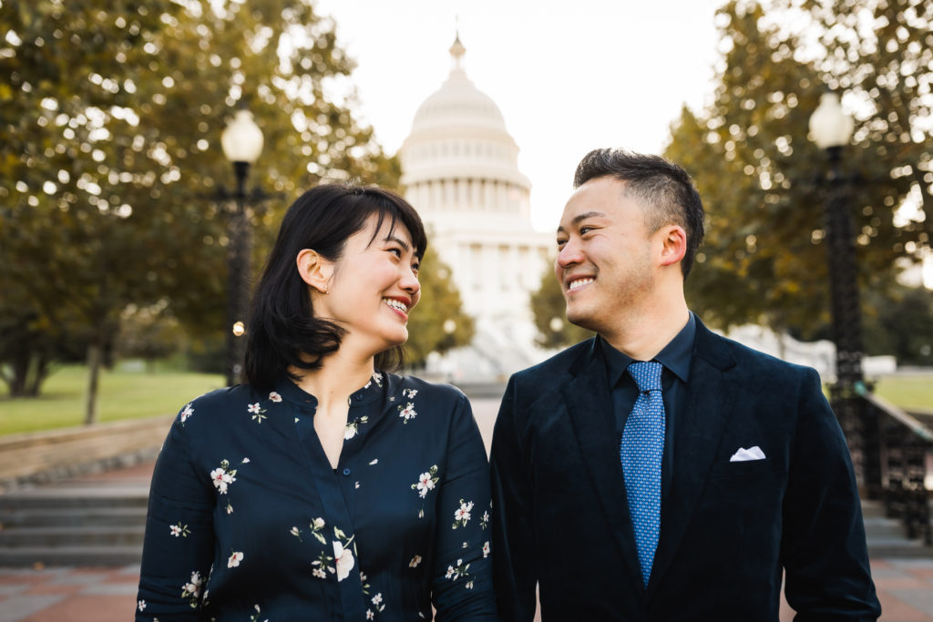 Couple smiling and celebrating during D.C. engagement session