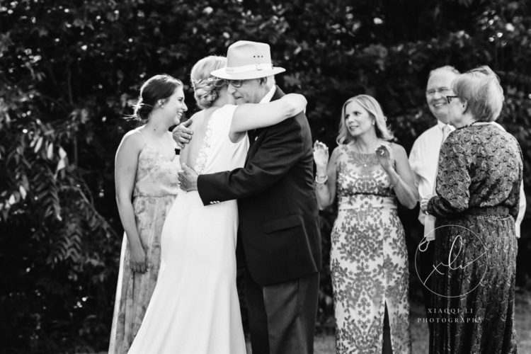 bride hugging family at Charlottesville wedding