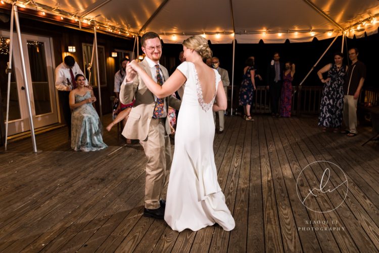Bride and groom dancing together as husband and wife at Montfair Resort Farm