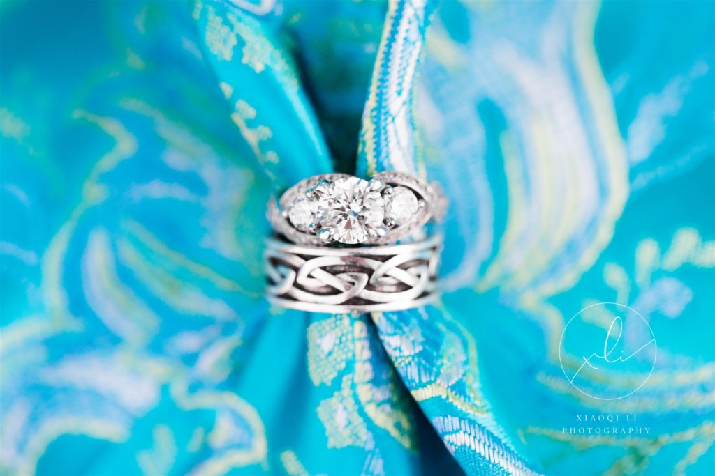 engagement ring on traditional ao dai detail shot