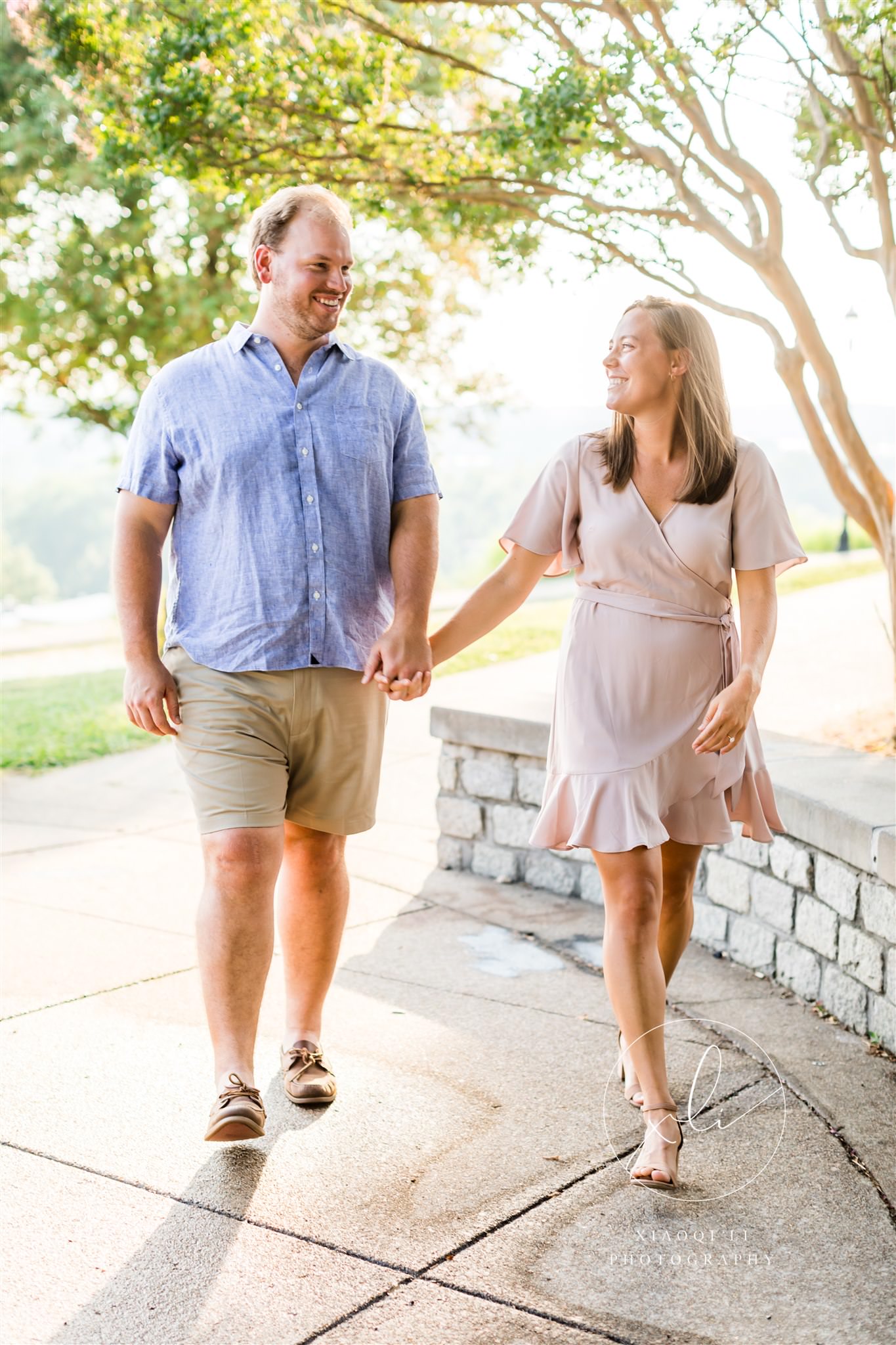 young engaged couple walking in libby hill engagement session
