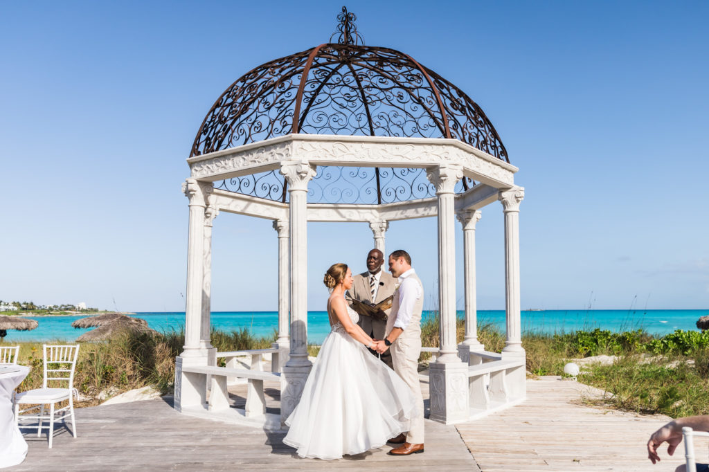 Couple getting married on Exuma Beach in Bahamas
