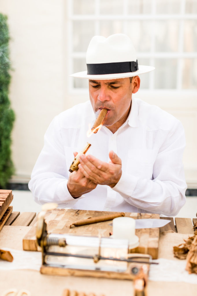 cuban cigars being rolled at Cuban inspired wedding in Miami Florida