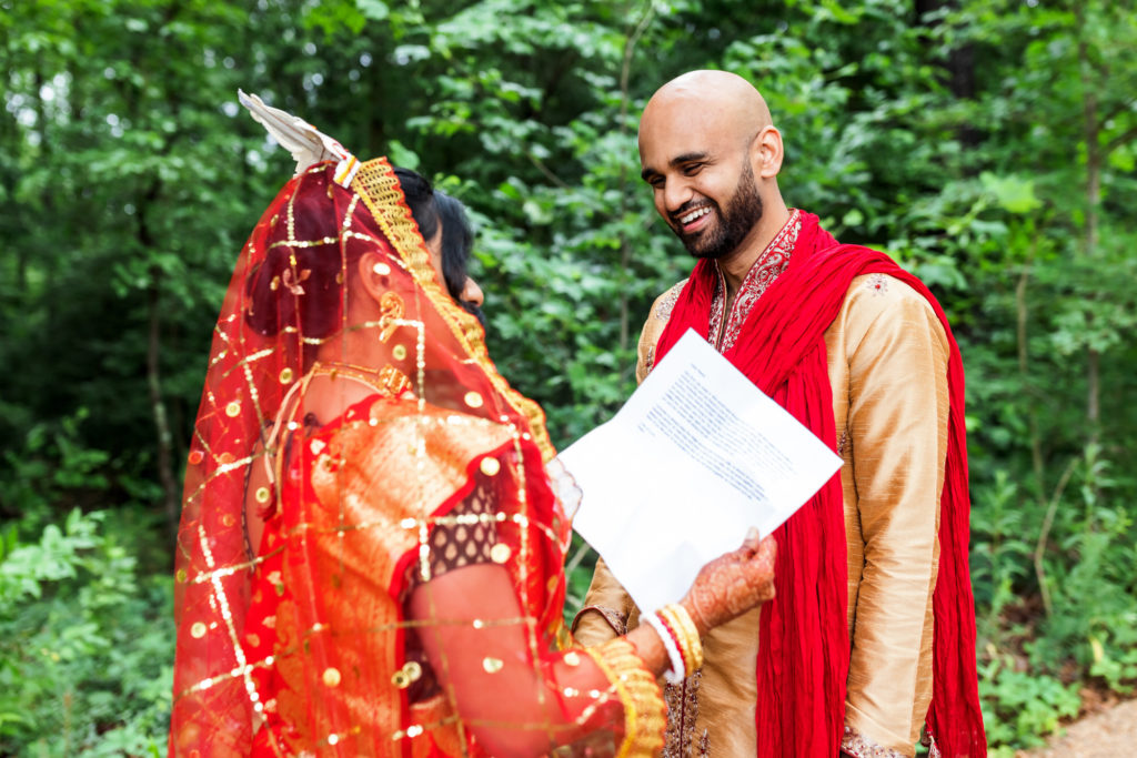 man looking at woman on wedding day in Richmond Virginia at hindu muslim interfaith wedding