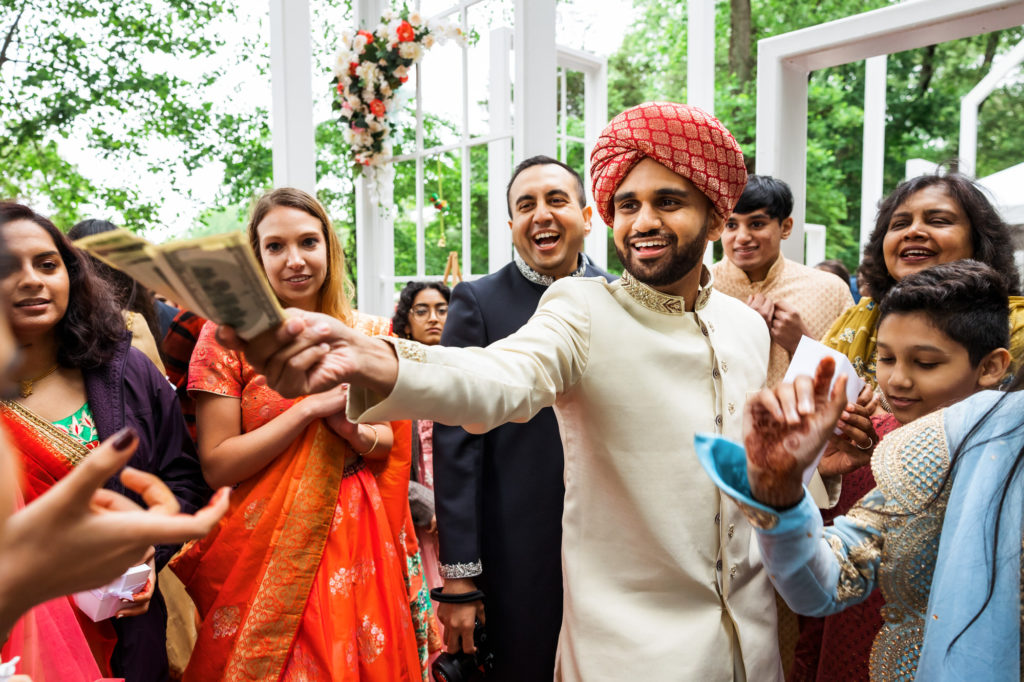groom having fun and laughing together during wedding celebrations