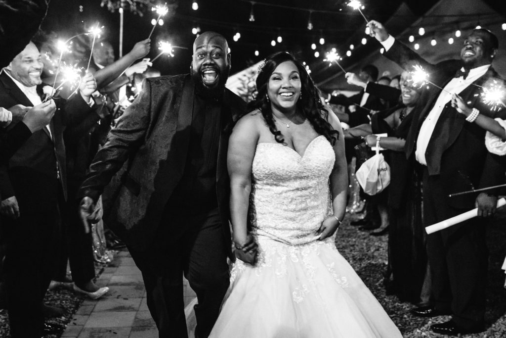 couple exits in sparkler exit as husband and wife from mankin mansion wedding