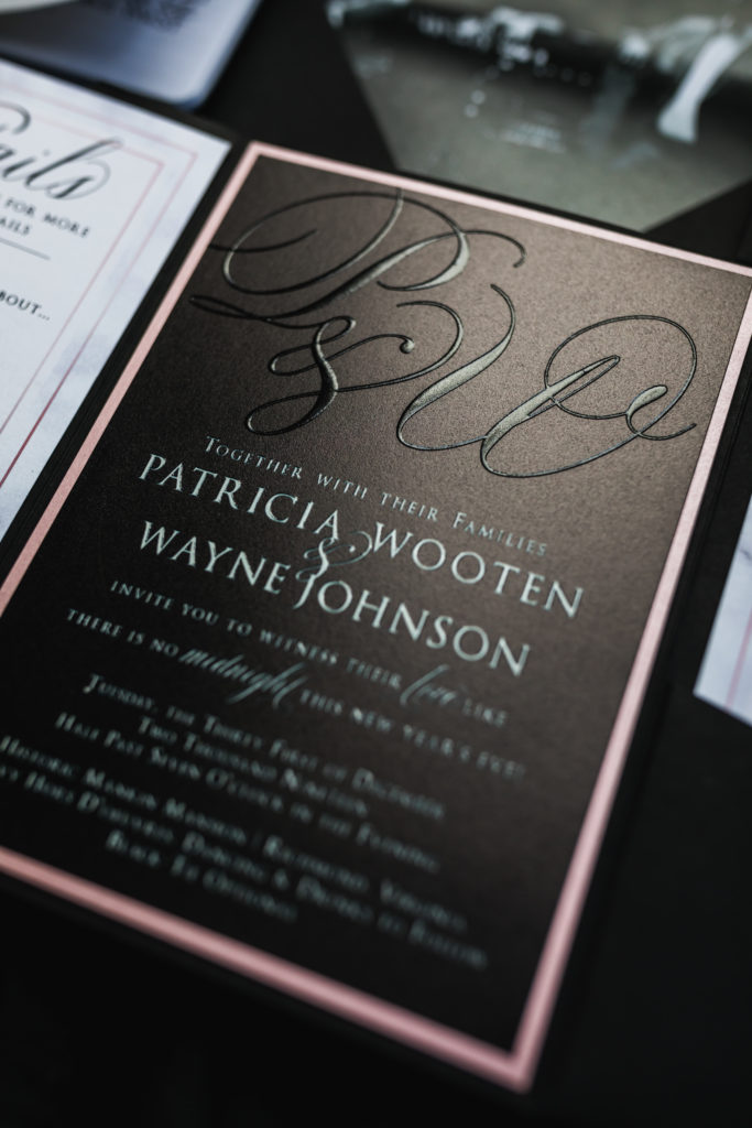 black and white wedding invitation for mankin mansion new year's eve wedding
