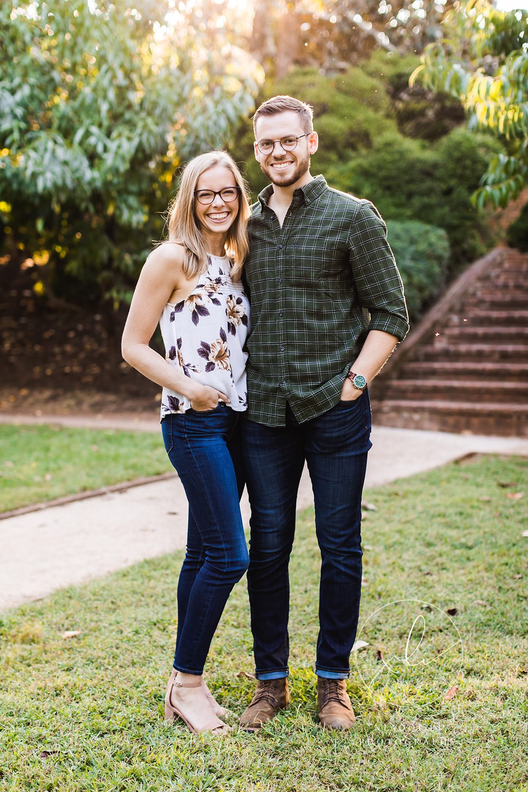 newly engaged couple standing together during fall university of virginia engagement session