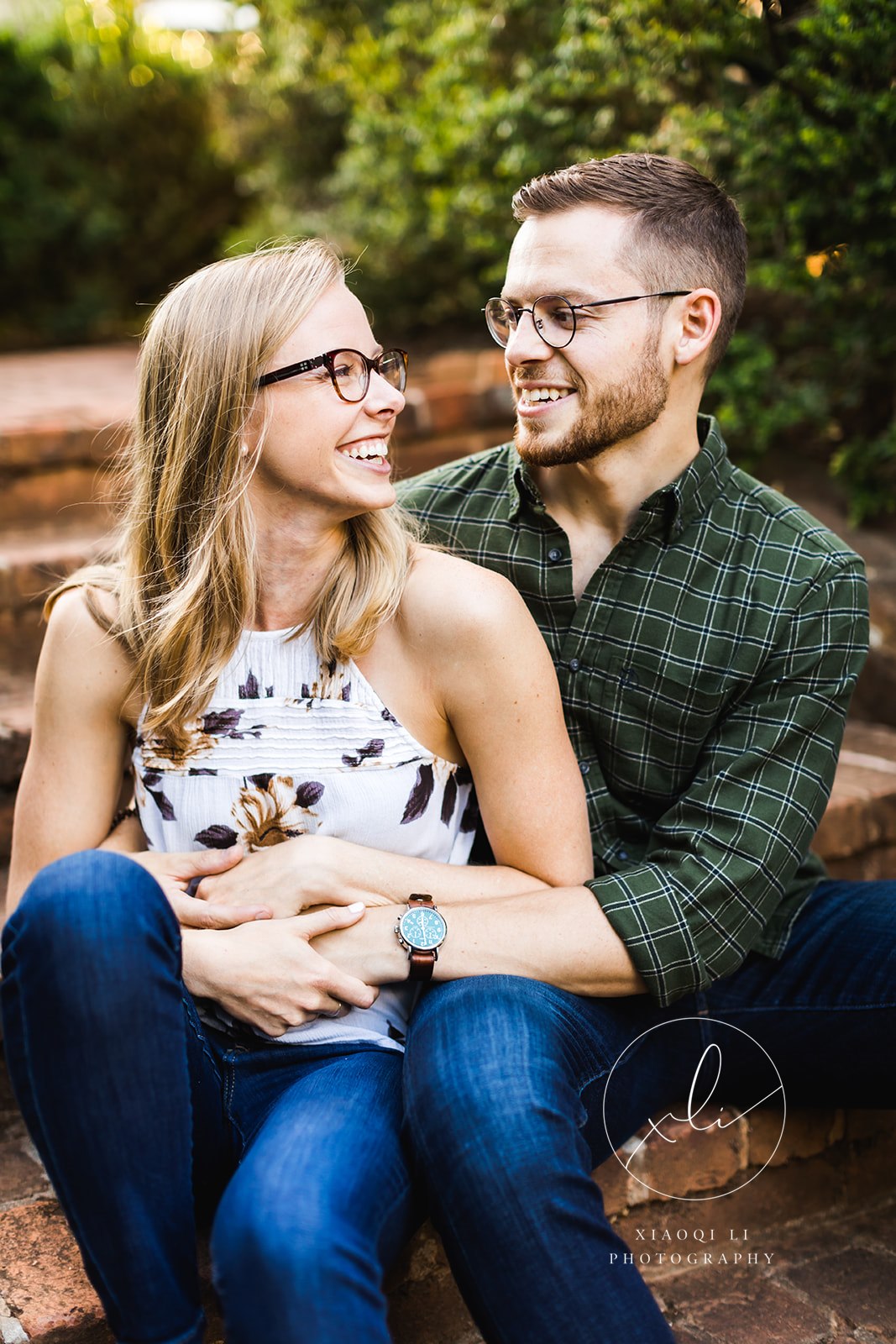 couple sitting together during fall university of virginia engagement