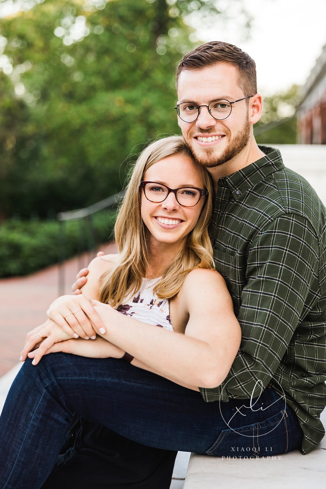 couple sitting during during fall university of virginia engagement session
