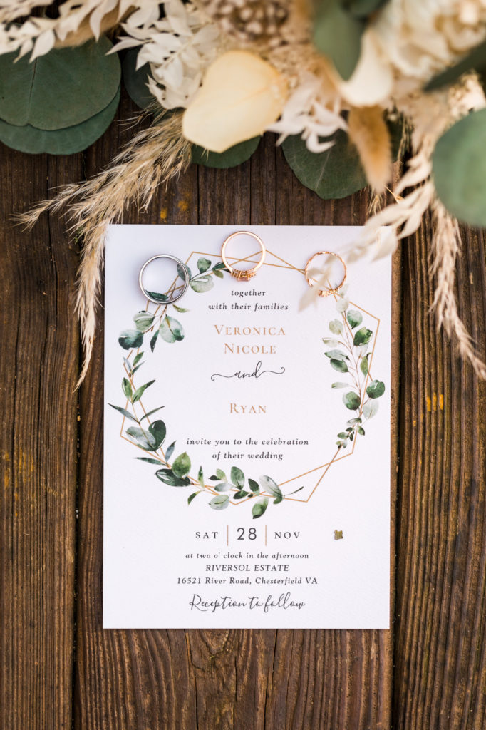 woodland chic airbnb wedding invitation with greenery and floral
