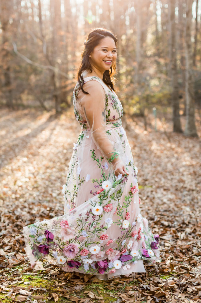 bride spinning in blush dress on outdoor wedding day