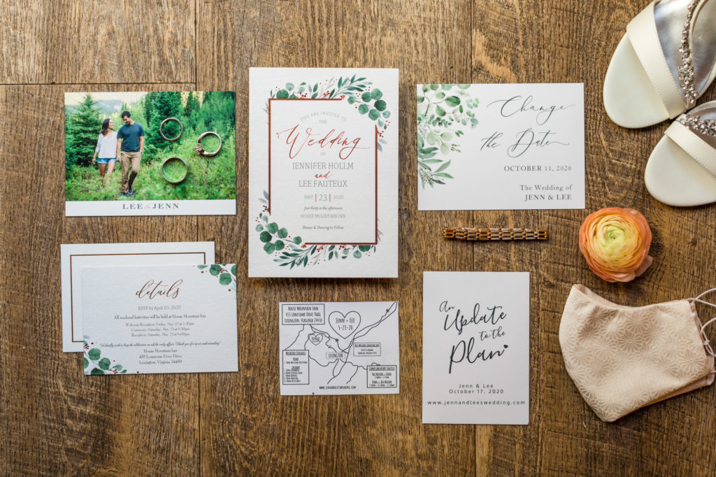 house mountain inn fall wedding details with greenery filled invitations
