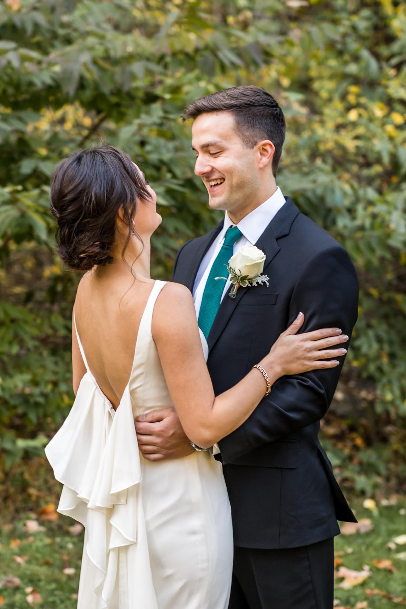 wedding couple embrace after first look
