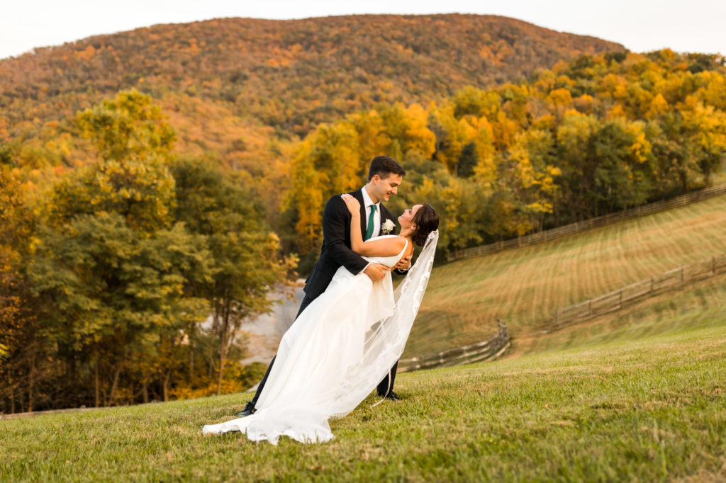 man and woman dancing during bridal portraits at house mountain inn wedding