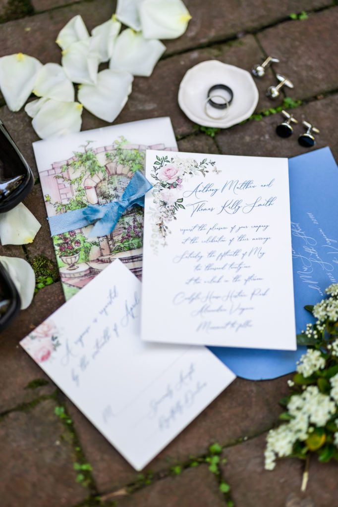white flowers blue wedding invitations
