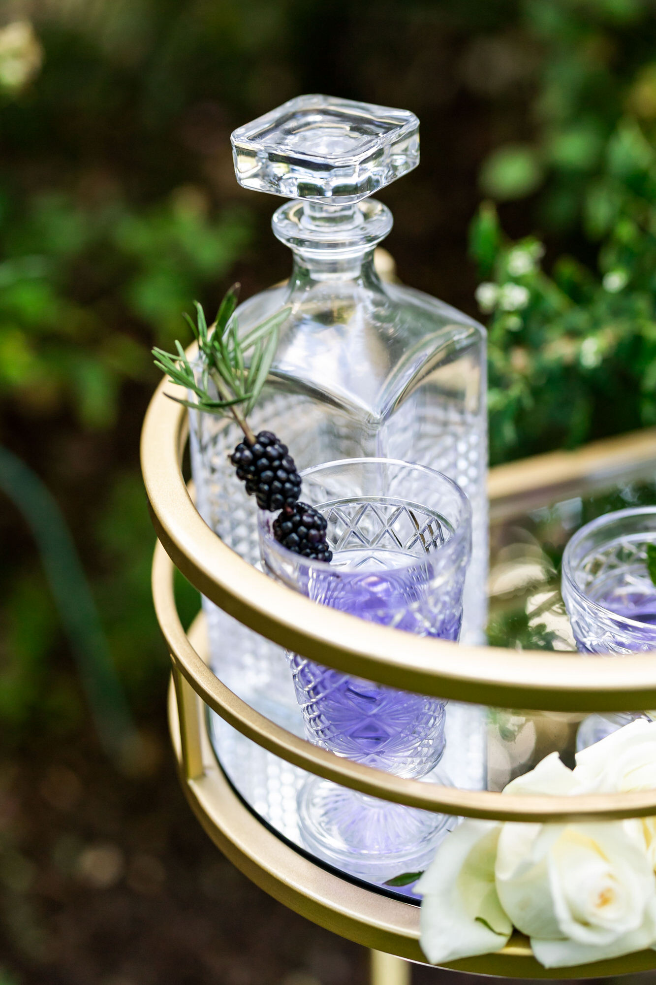 purple drinks with blackberries for signature drink during bridgerton styled shoot