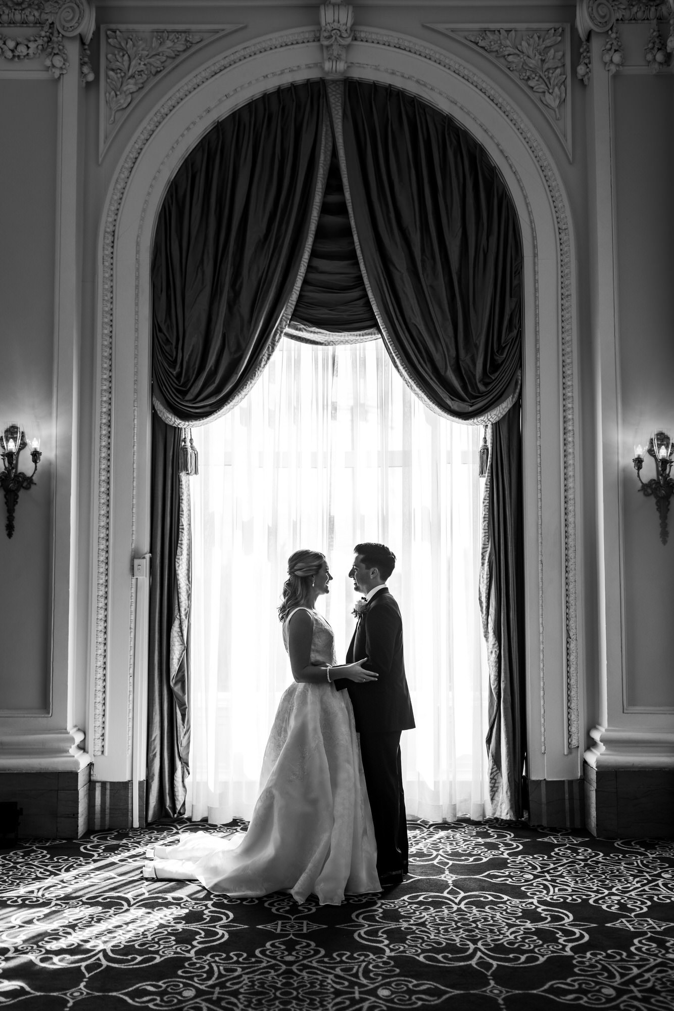 bride and groom embracing after seeing one another for first time on wedding day at Jefferson Hotel