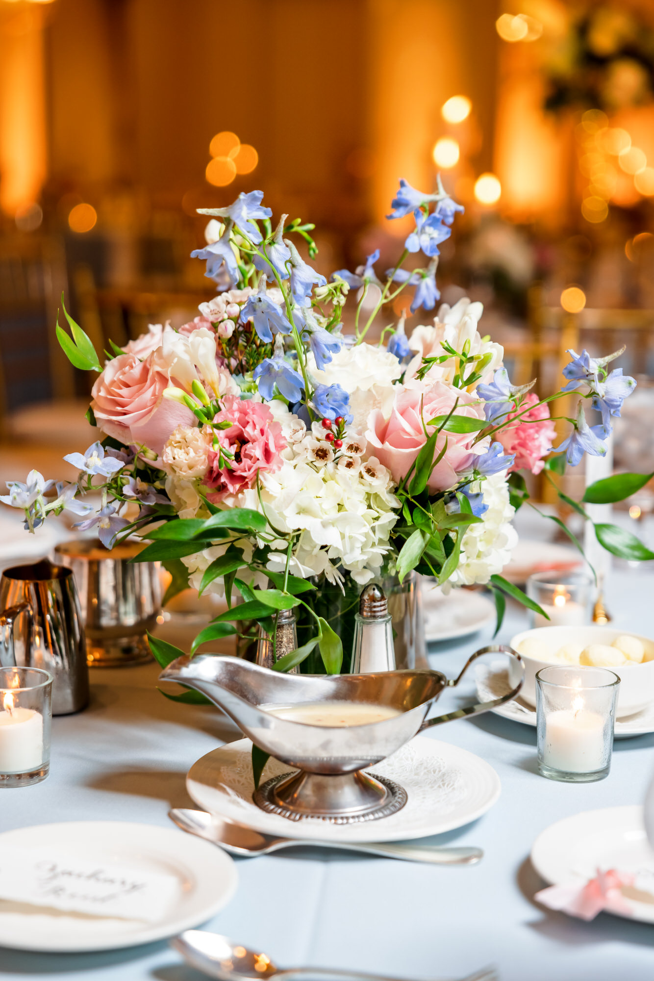 pink, blue, white, floral centerpieces for elegant wedding reception