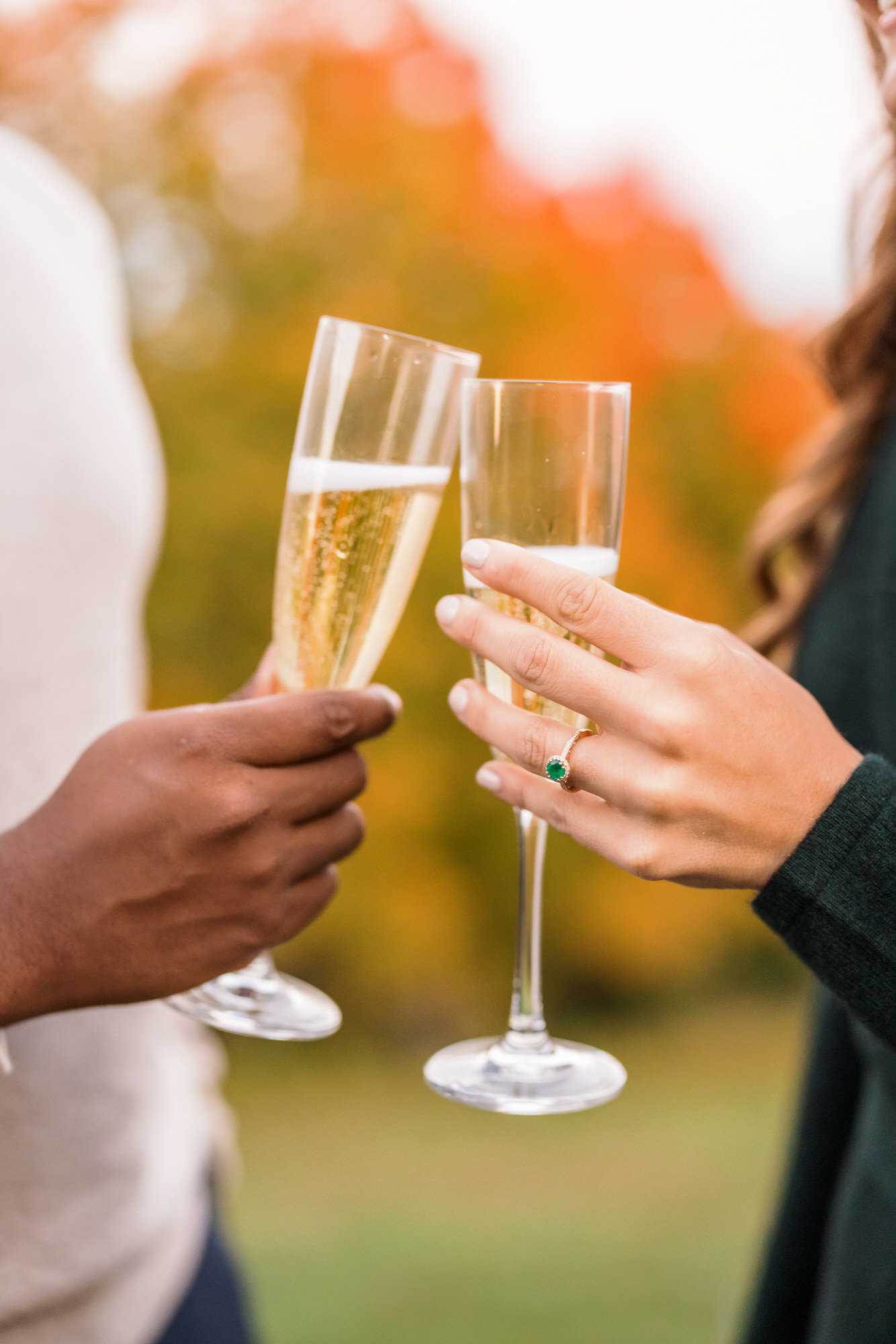 man and woman toasting champagne glasses 