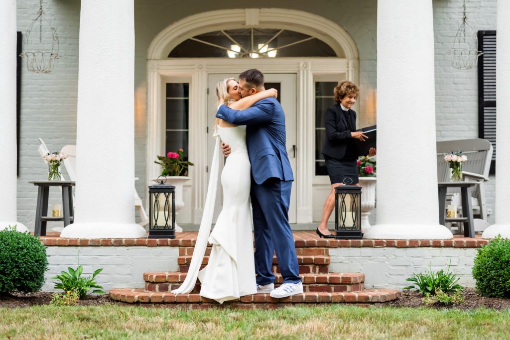 bride and groom hugging after intimate wedding ceremony