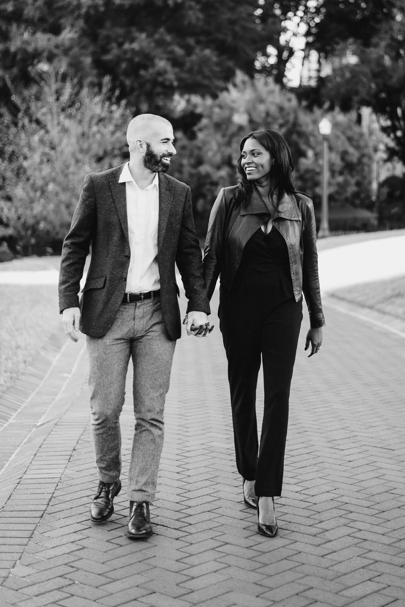 newly engaged couple walking through richmond engagement session