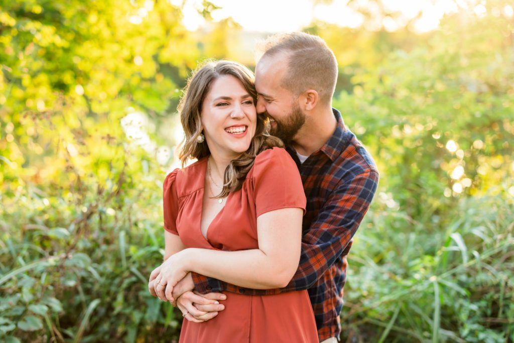 couple embracing during richmond engagement session 