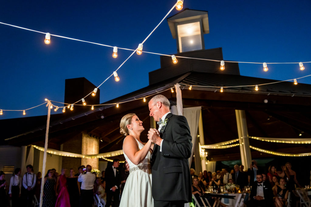 bride dancing with father during father-daughter dance