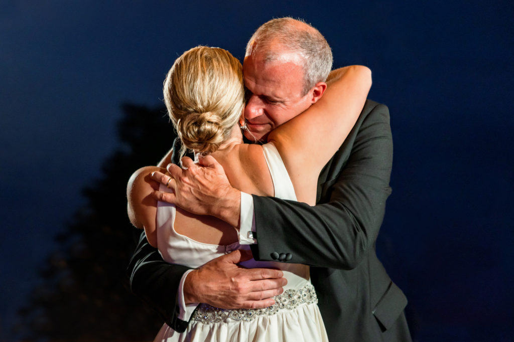 bride hugging father on black tie eastern shore wedding