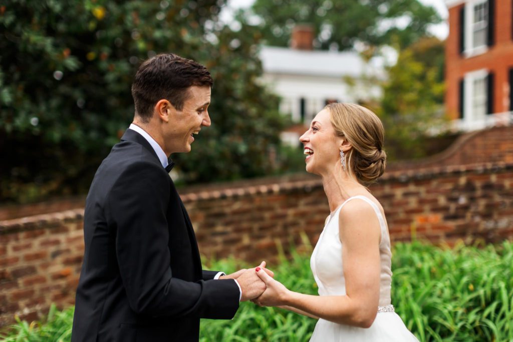 couple laughing together on wool factory wedding day