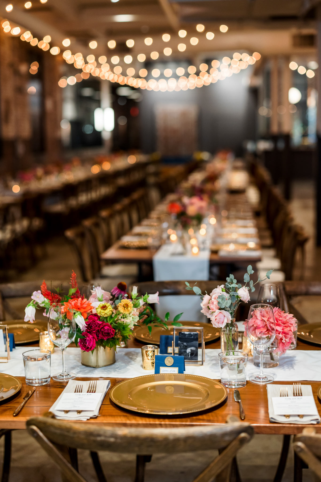 table settings at indoor black tie wool factory wedding 