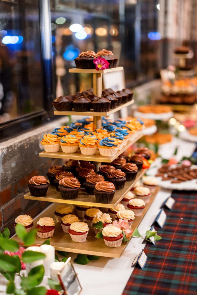 dessert table with cupcakes at black tie wool factory wedding