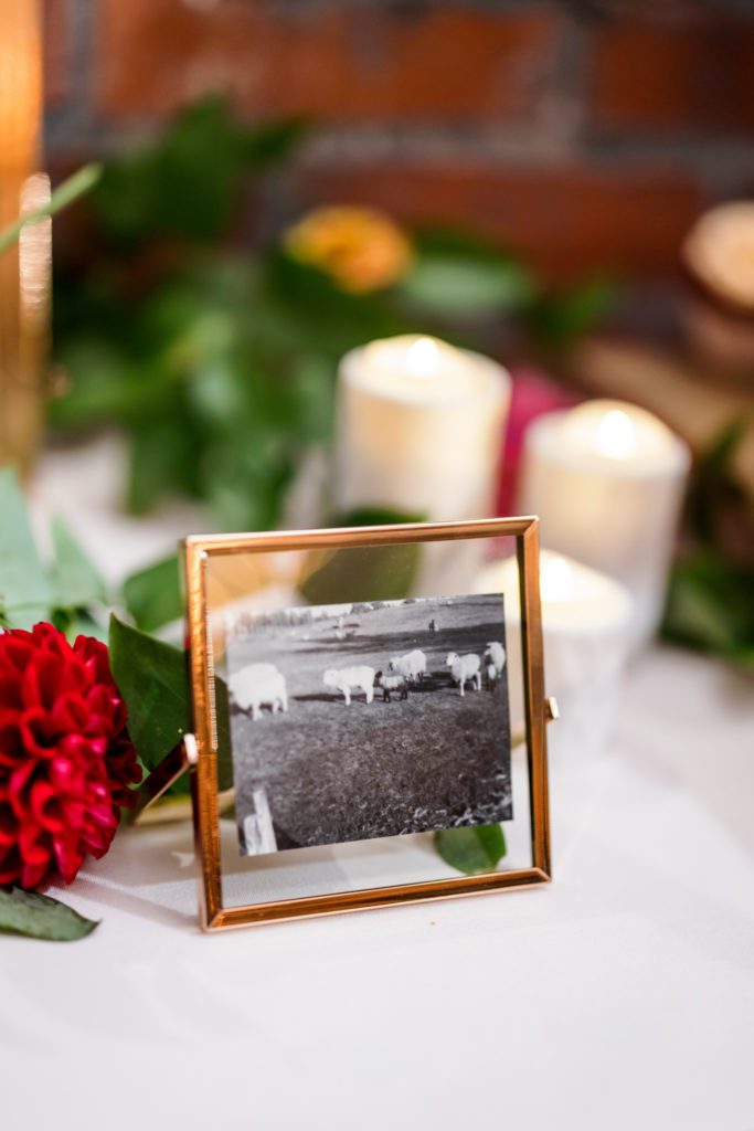 gold frame with black and white picture for wedding centerpiece