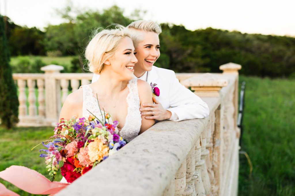 couple sitting together after spanish inspired wedding