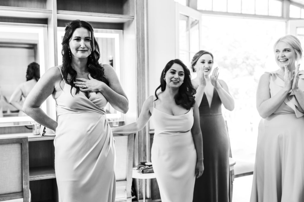 bridesmaids smiling and celebrating fall castle hill cider wedding