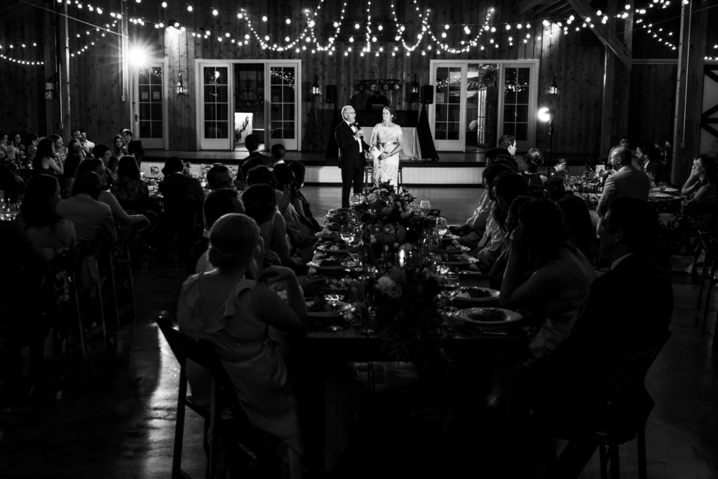 black and white portrait of guests at wedding reception