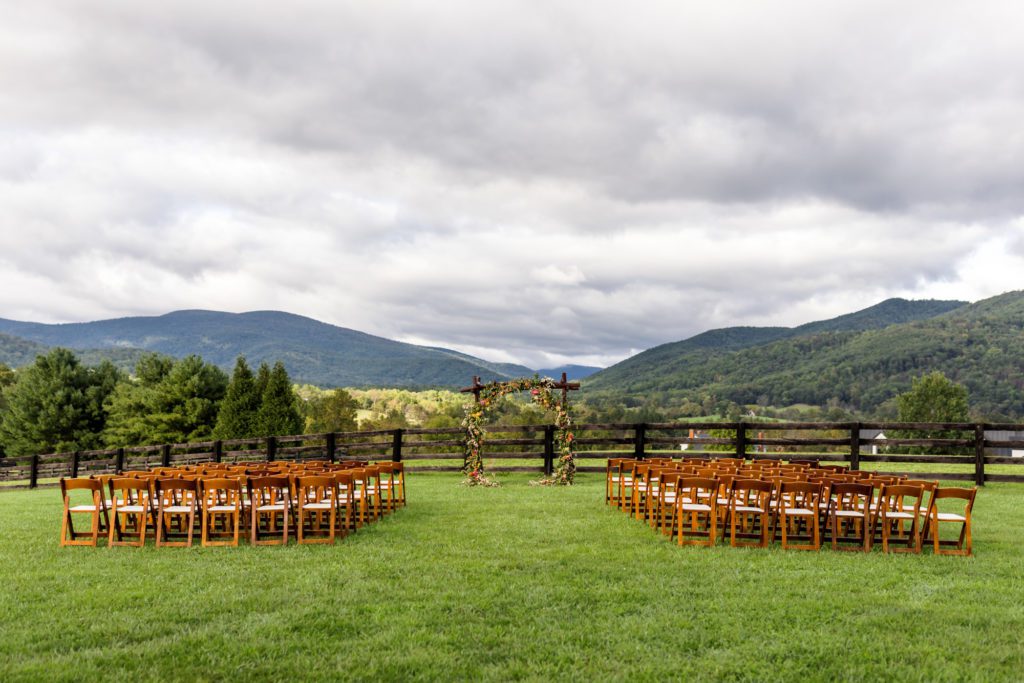montfair resort outdoor ceremony setting with wooden chairs 