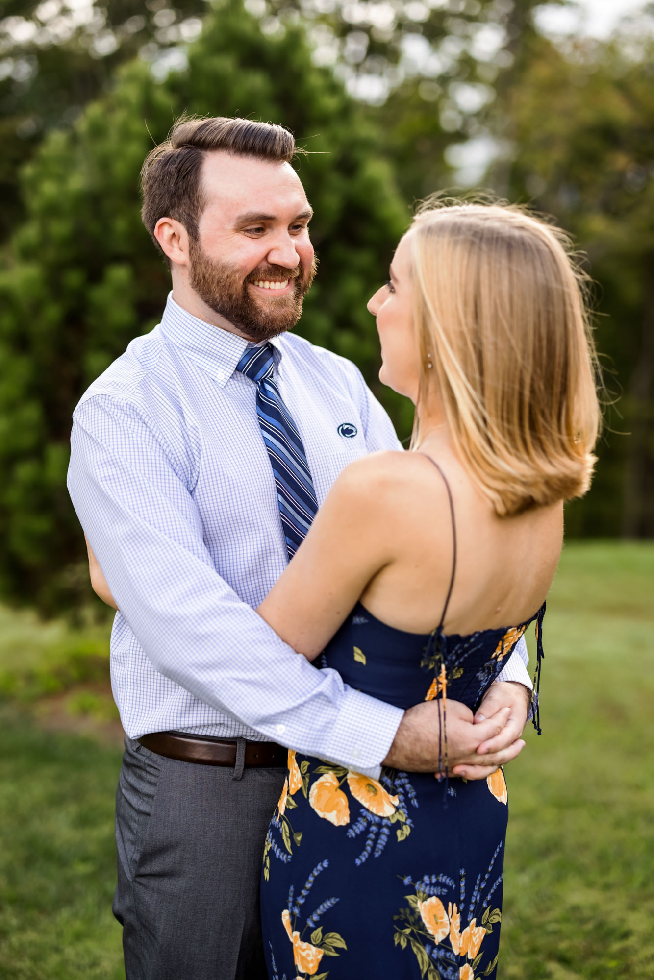 couple embracing during engagement session 