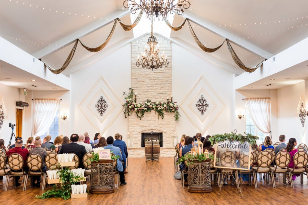indoor wedding ceremony set up for summer Potomac point winery wedidng