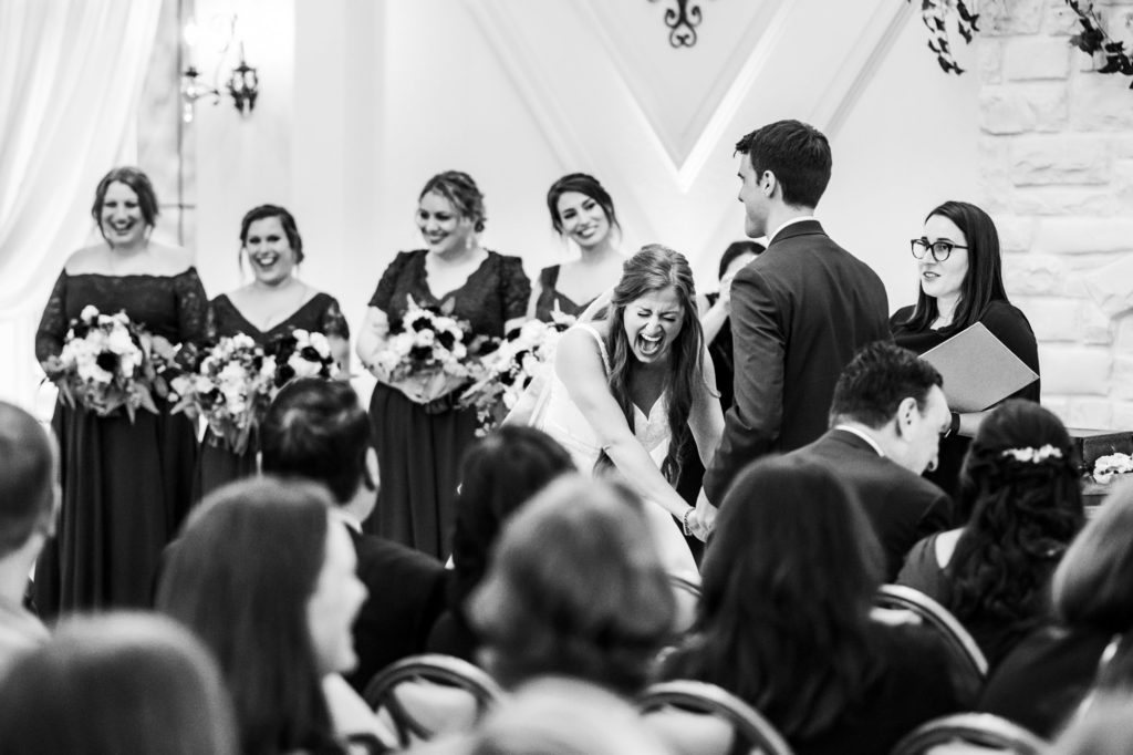 black and white portrait of wedding party during ceremony