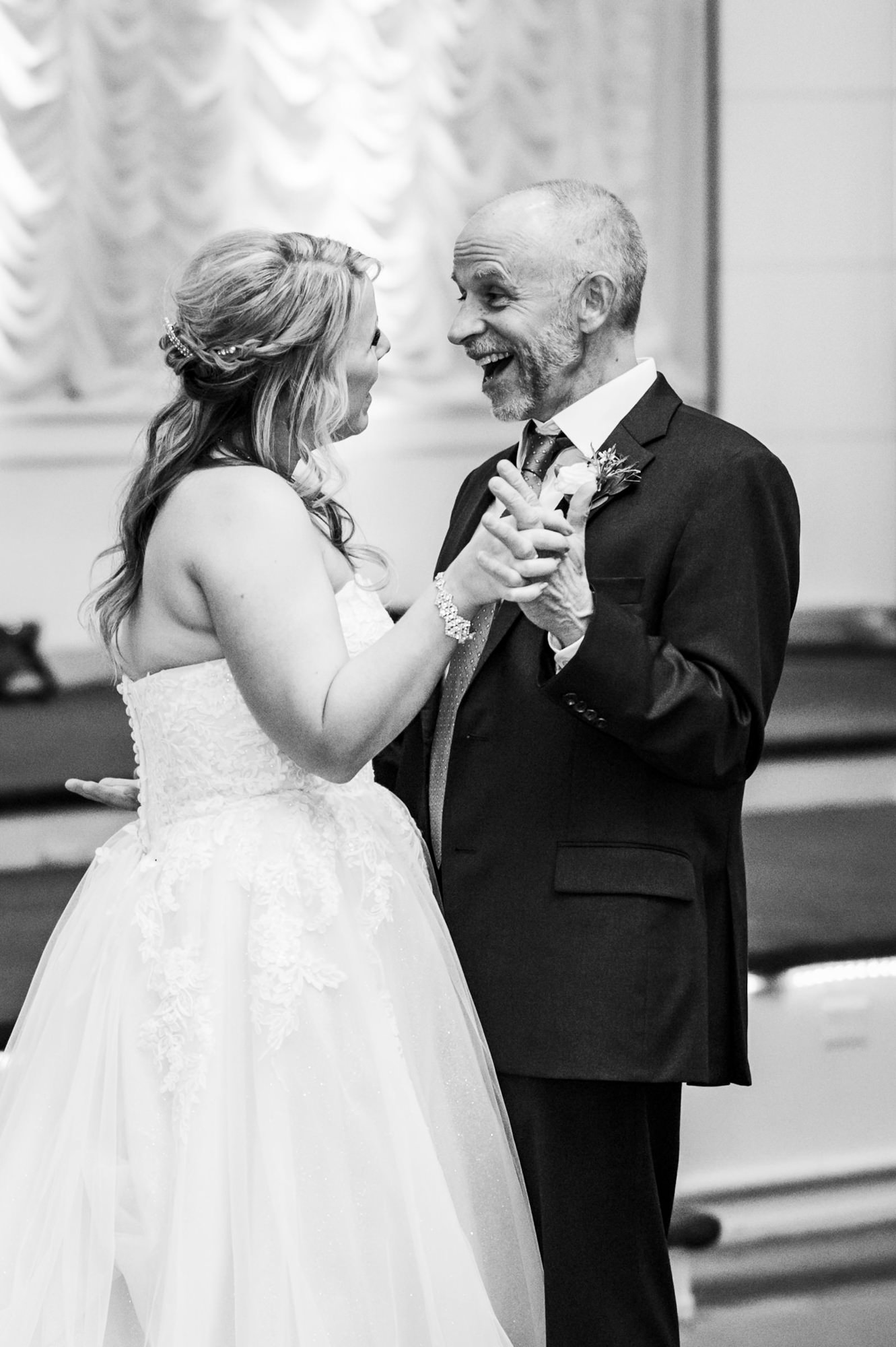 bride dancing with father at the renaissance wedding reception