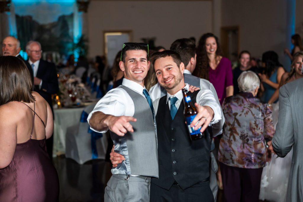 groom toasting and having fun with guests