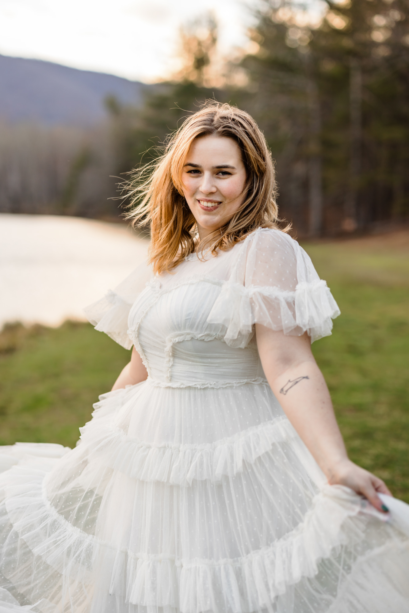 bride spinning bohemian inspired wedding dress with tiers