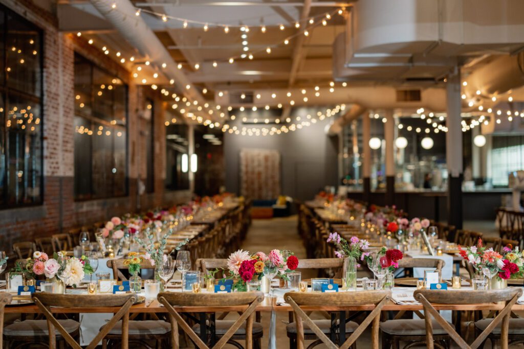 indoor view of Wool Factory wedding reception with twinkling lights 