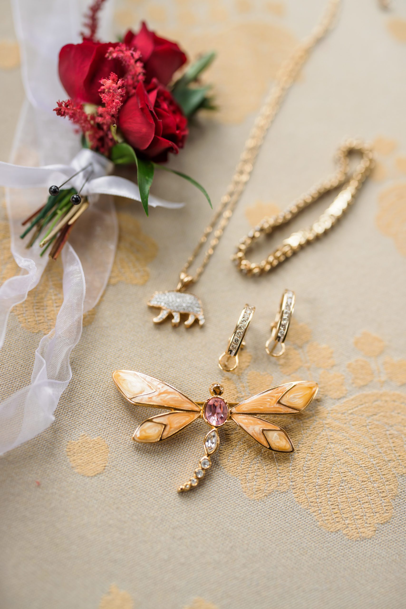 gold dragon fly clip, necklace and other special bridal details