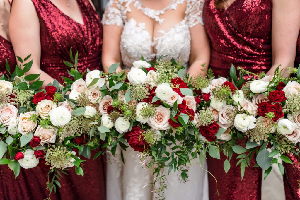 close up of bride and bridesmaid bouquets 