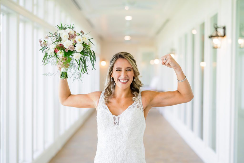 bride flexing muscles 