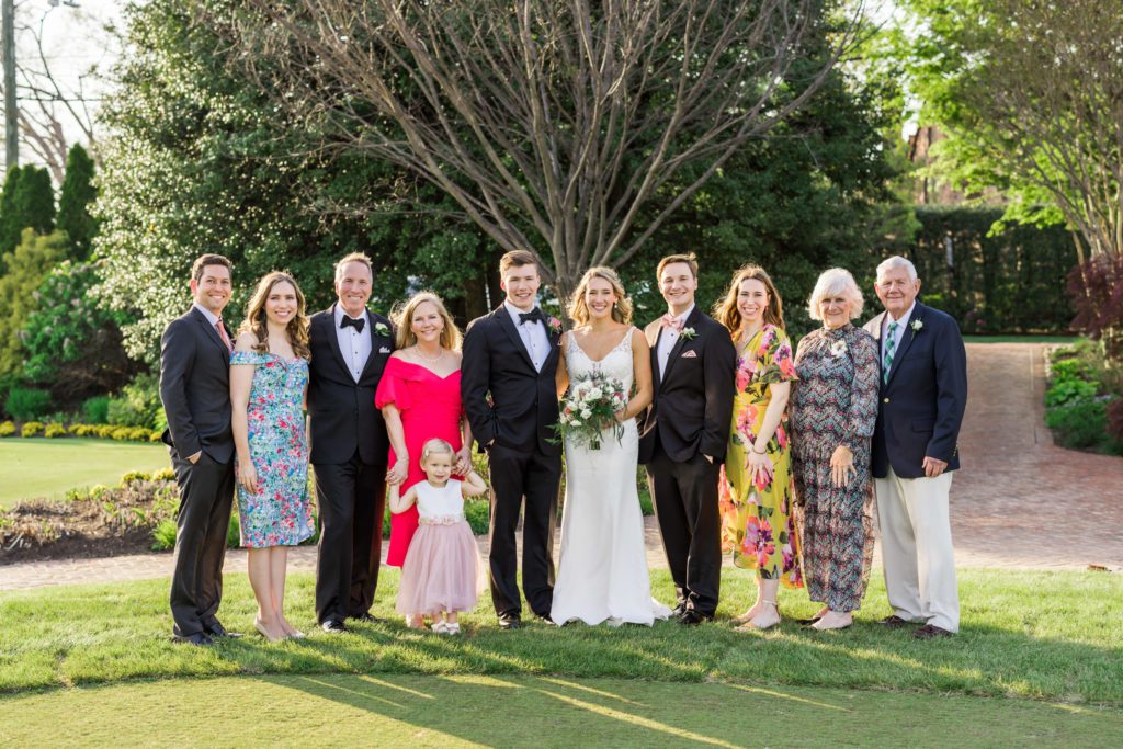 bride and groom together during family portraits after elegant spring washington golf and country club